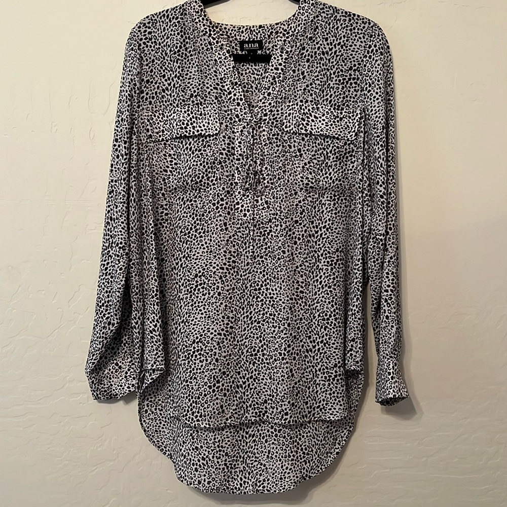 A.N.A. Size large Tunic black/white animal print  top. Long sleeve. Euc